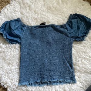 Get ready for the summer with this blur crop top, denim  fabric.